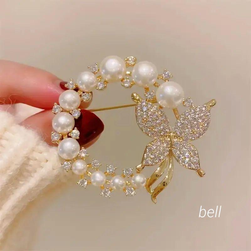 ブローチ パール 蝶 ゴールド キラキラ おしゃれ 卒業式 パーティー拍卖