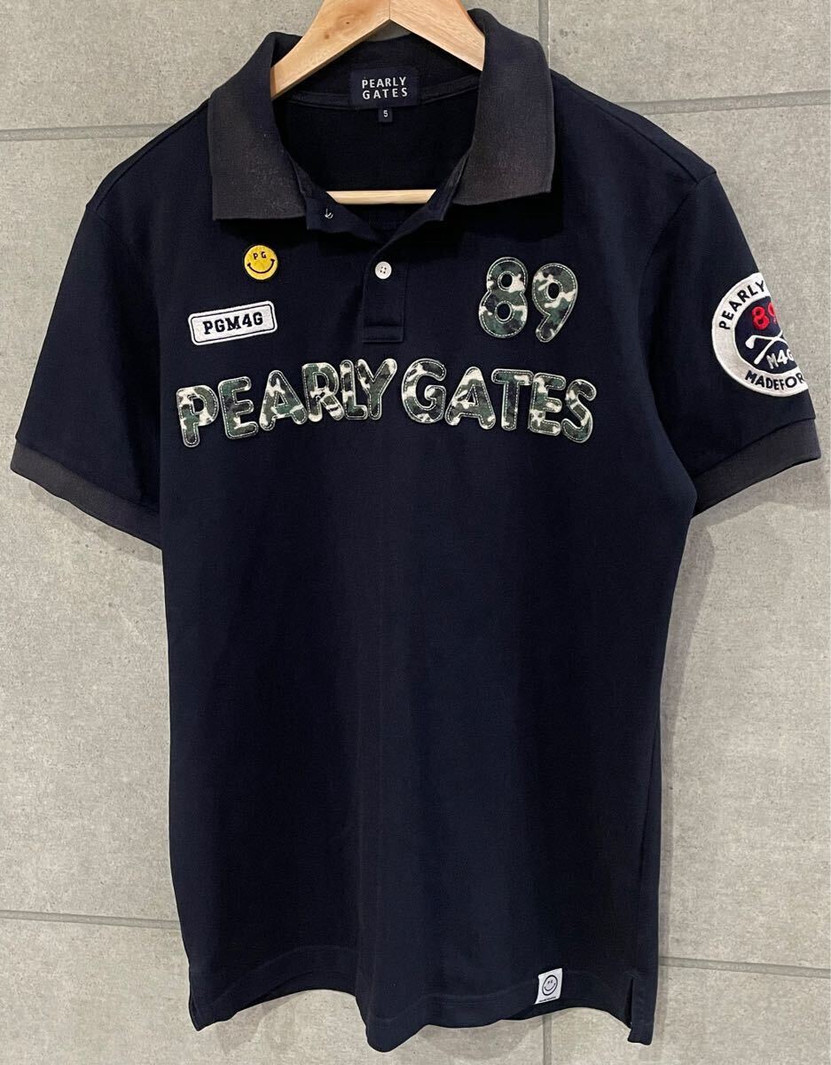 今が買い時! PEARLY GATES パーリーゲイツ 吸汗速乾 PGニコちゃん PGM4G 迷彩 半袖ポロシャツ ネイビー 5サイズ レターパック可 ◯ 新規×拍卖