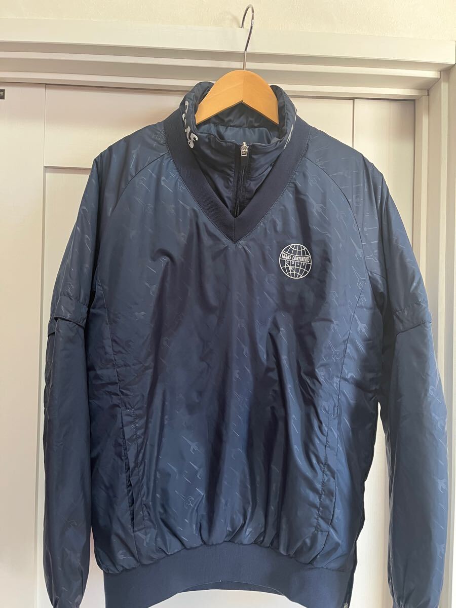 トランスコンチネンツ TRANS CONTINENTS 18WTRM006-NV ゴルフウェア 衿袖取り外し可能 中綿 L拍卖