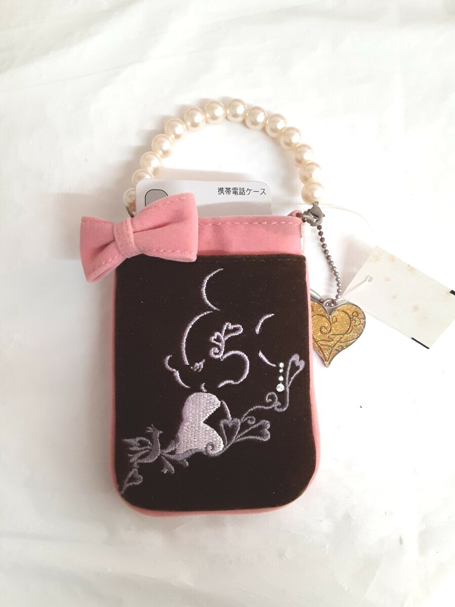 ☆ディズニー☆東京ディズニーリゾート☆ガラケー☆折りたたみケータイ☆ミニー☆黒☆ピンク☆タグ付き☆すこし汚れあり☆拍卖