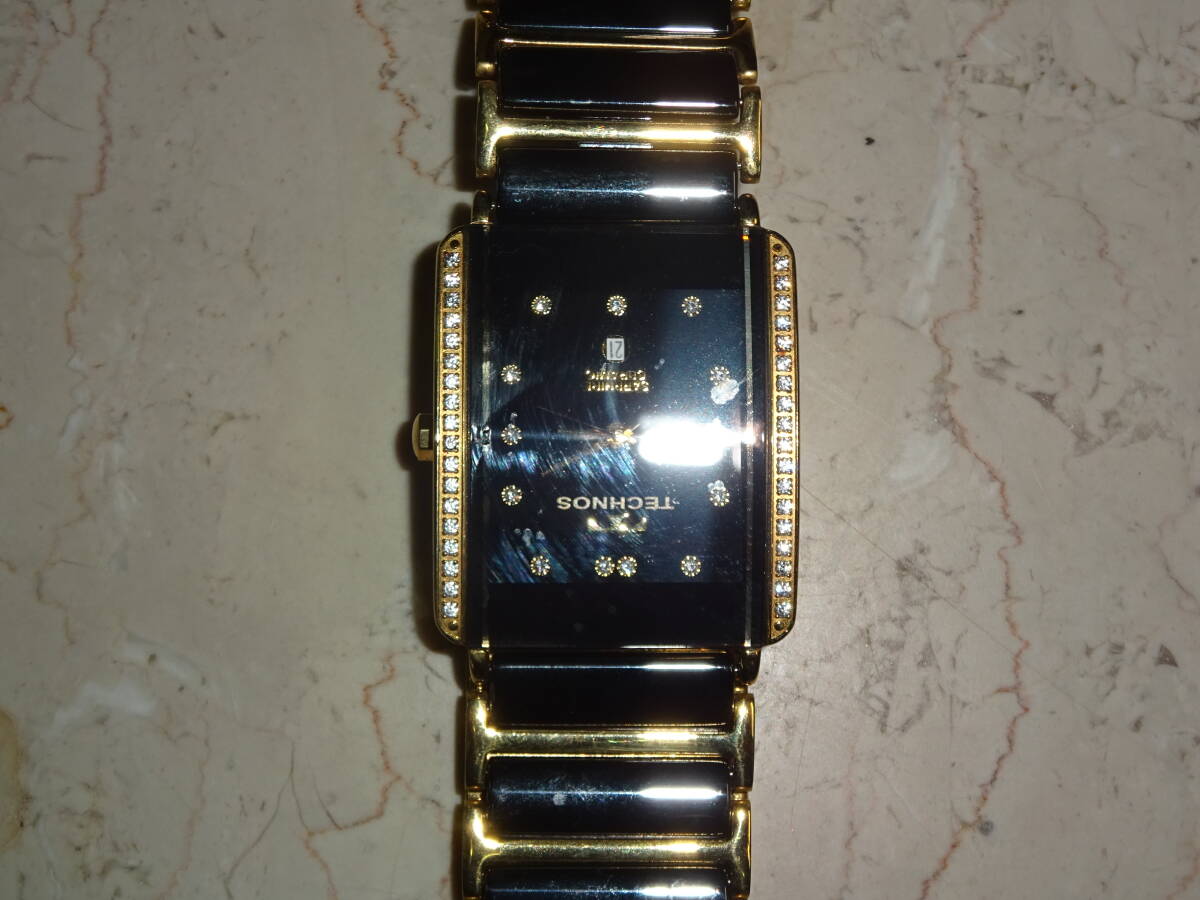 テクノス メンズ 時計 稼働品 両サイドにストーンが入ったお品拍卖