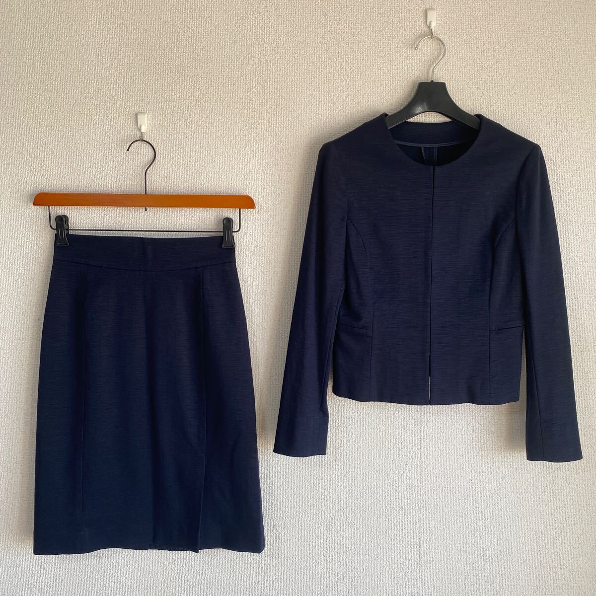 グリーンレーベル ノーカラースカートスーツ 36 W64 濃紺 ストレッチDMW拍卖