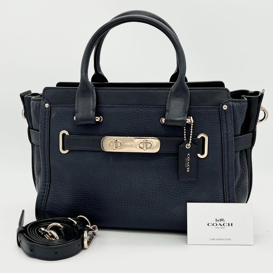 【美品】COACH コーチ スワッガー 27 ハンドバッグ 2way ショルダーバッグ 斜めがけ ゴールド金具 レザー レディース ネイビー AF300709C拍卖