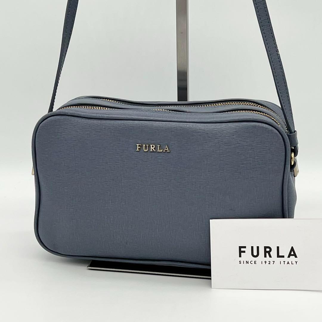 【良品】FURLA フルラ LILLI リリー カメラバッグ クロスボディ ショルダーバッグ レザー 斜めがけ 通勤 通学 レディース ブルー BE000319拍卖