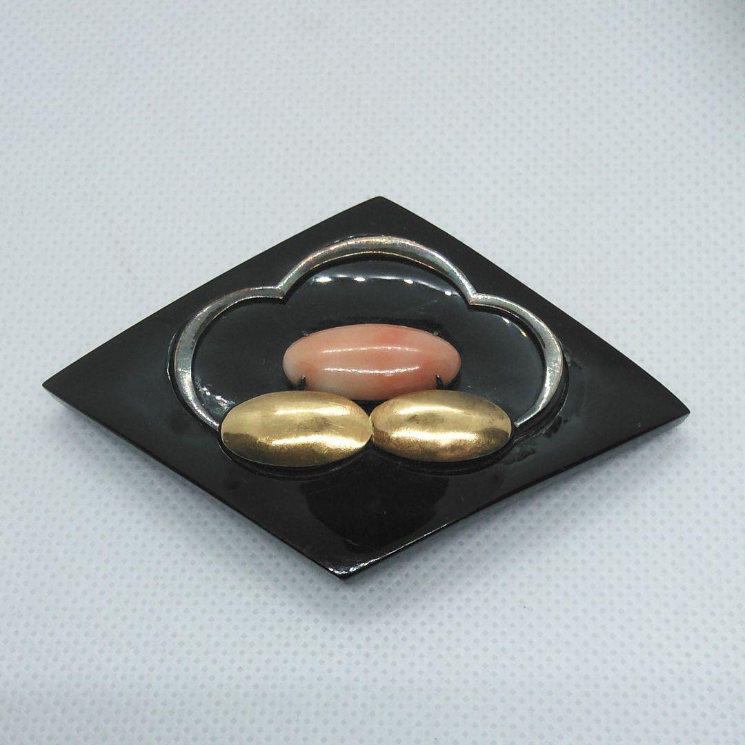 珊瑚と金箔の帯留拍卖