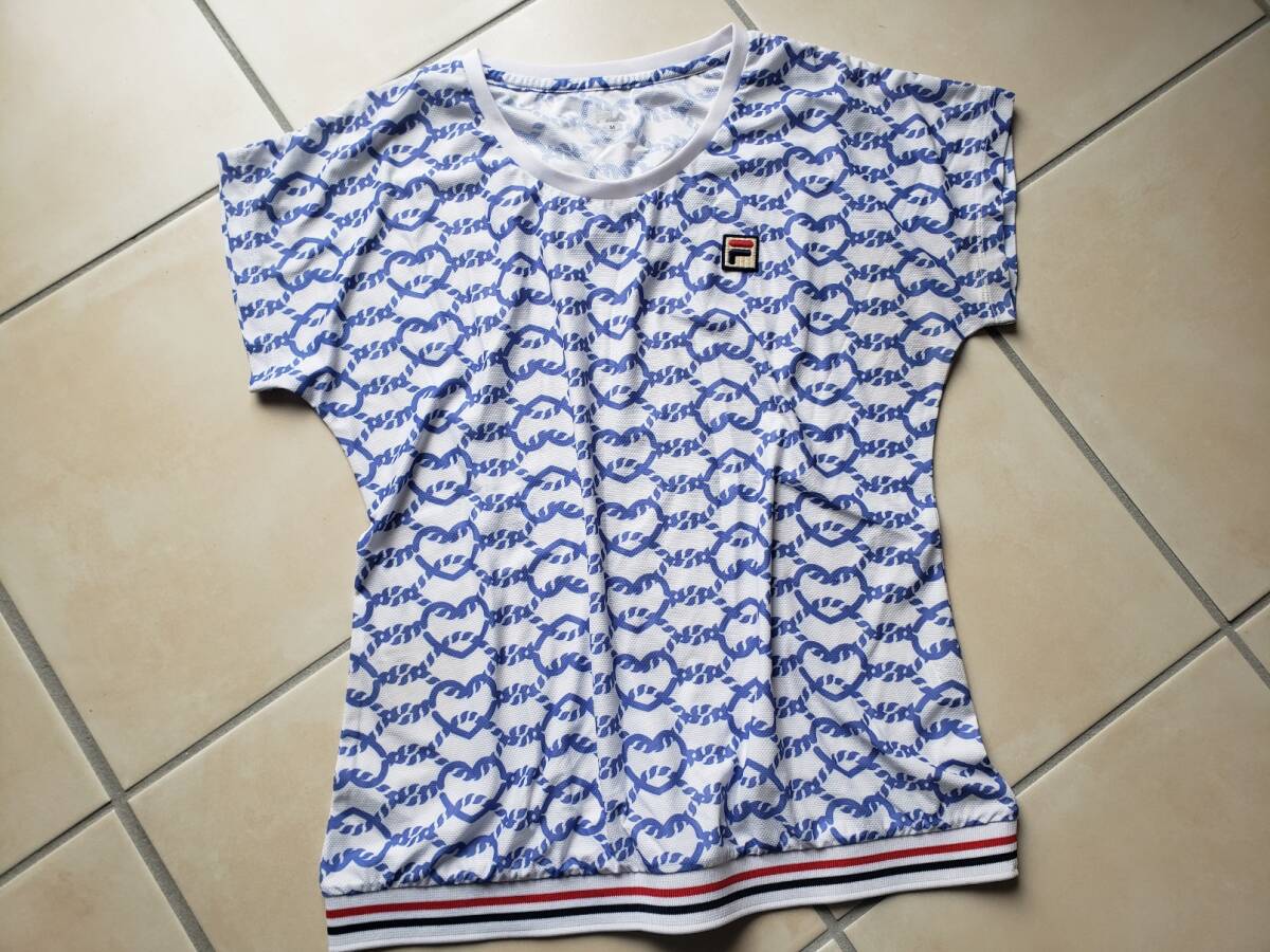 上質美品/FILAフィラ/テニストップス・ブルー白オープンハートモチーフ・トップスM拍卖