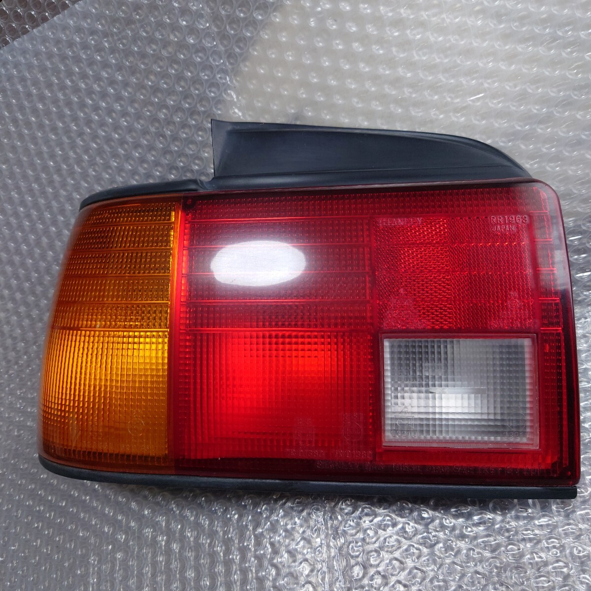 ダイハツ シャレード G102S 4ドアセダン SOCIAL SX Limited 左テールランプユニット 中古品拍卖