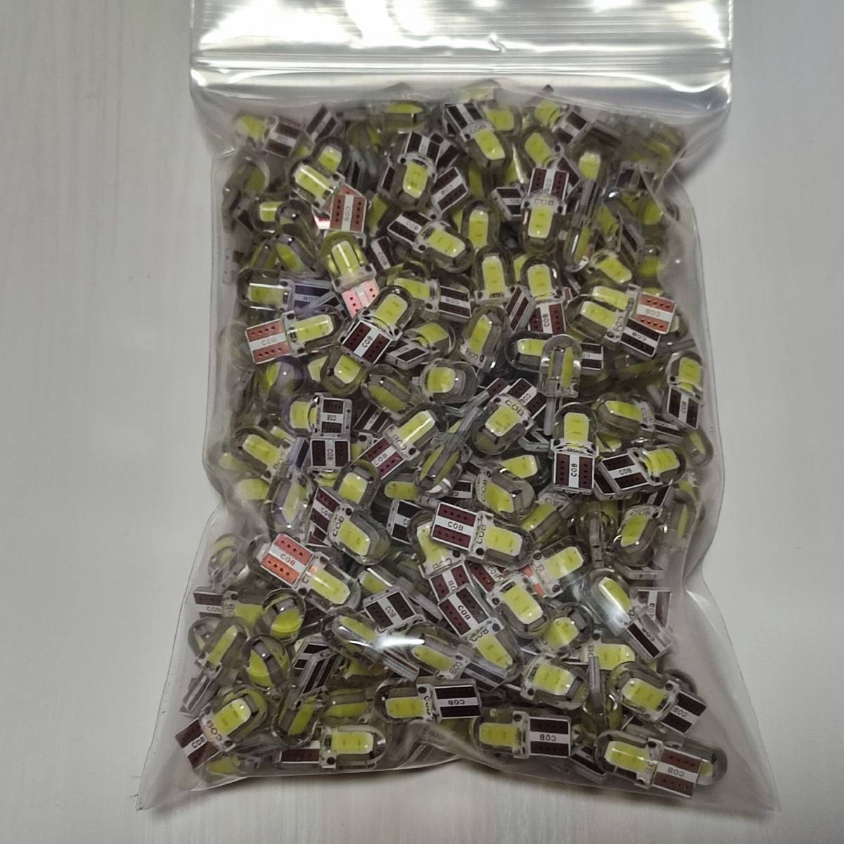 100個セット T10 COB LED ホワイト キャンセラー内蔵 ウェッジ球 スモール ポジション ルームランプ ナンバー灯 4COB /c2拍卖