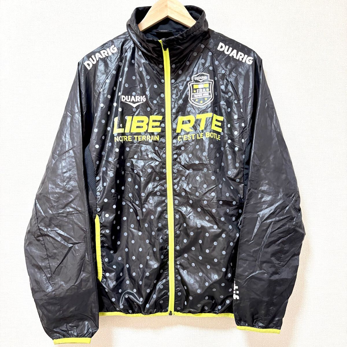 インパクト大!ウォームアップに◎【DUARIG】デュアリグ ウィンドブレーカー 黒 ロゴ プリント サッカー フットサル サイズL/Y26307SS拍卖