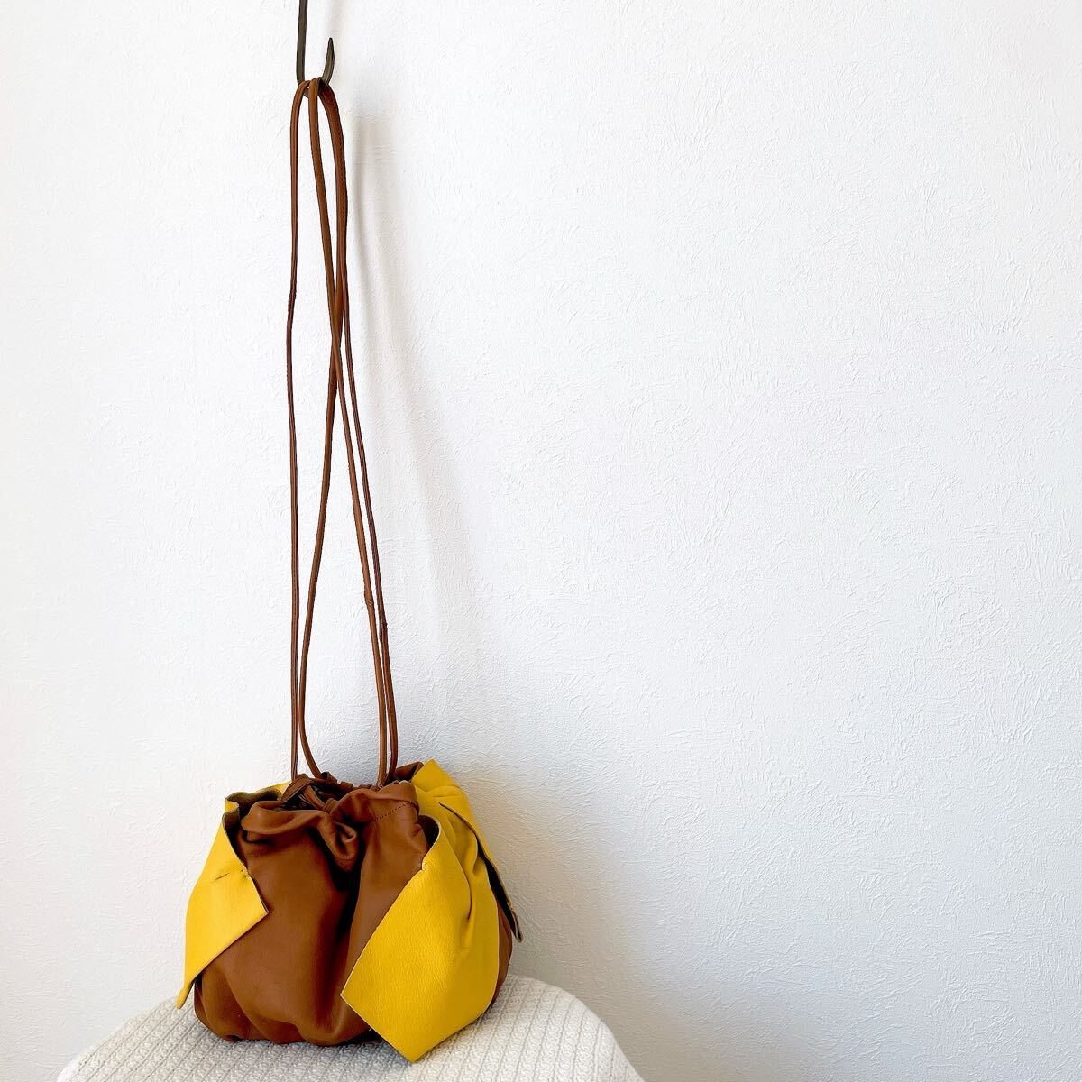 おしゃれ華やかポシェット黄色ブラウン茶色イエロー リボン ショルダーバッグ本革レザー合皮フェイクレザー 巾着バケツ バッグレディース 拍卖