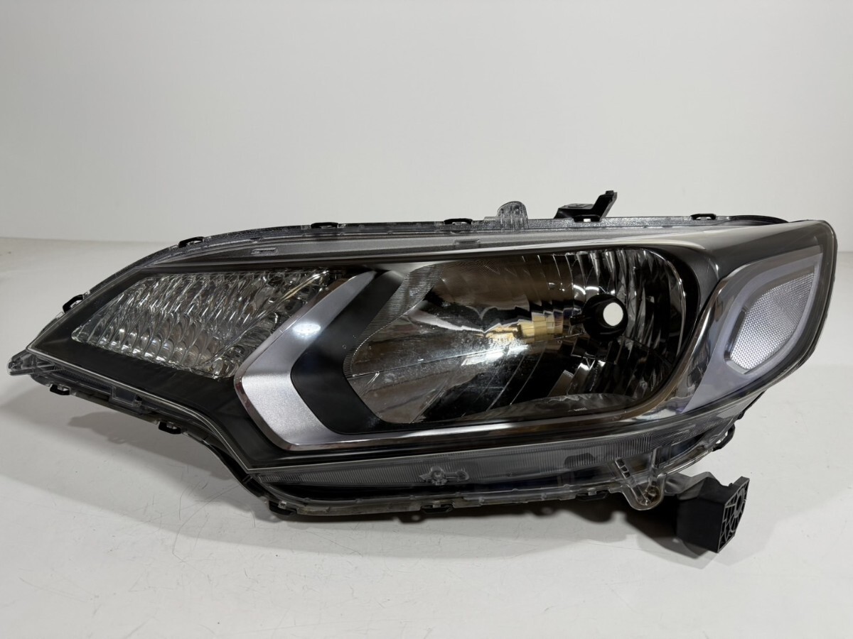 ホンダ純正 GK系 GK3 GK4 GP5/GP6 フィット ハロゲン ヘッドライト 左側 STANLEY W0349 刻印1 棚番L-1364拍卖