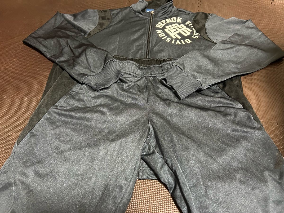 超美品Reebokグレー、黒、ロゴ白、黒ストレッチ上下セット サイズL拍卖