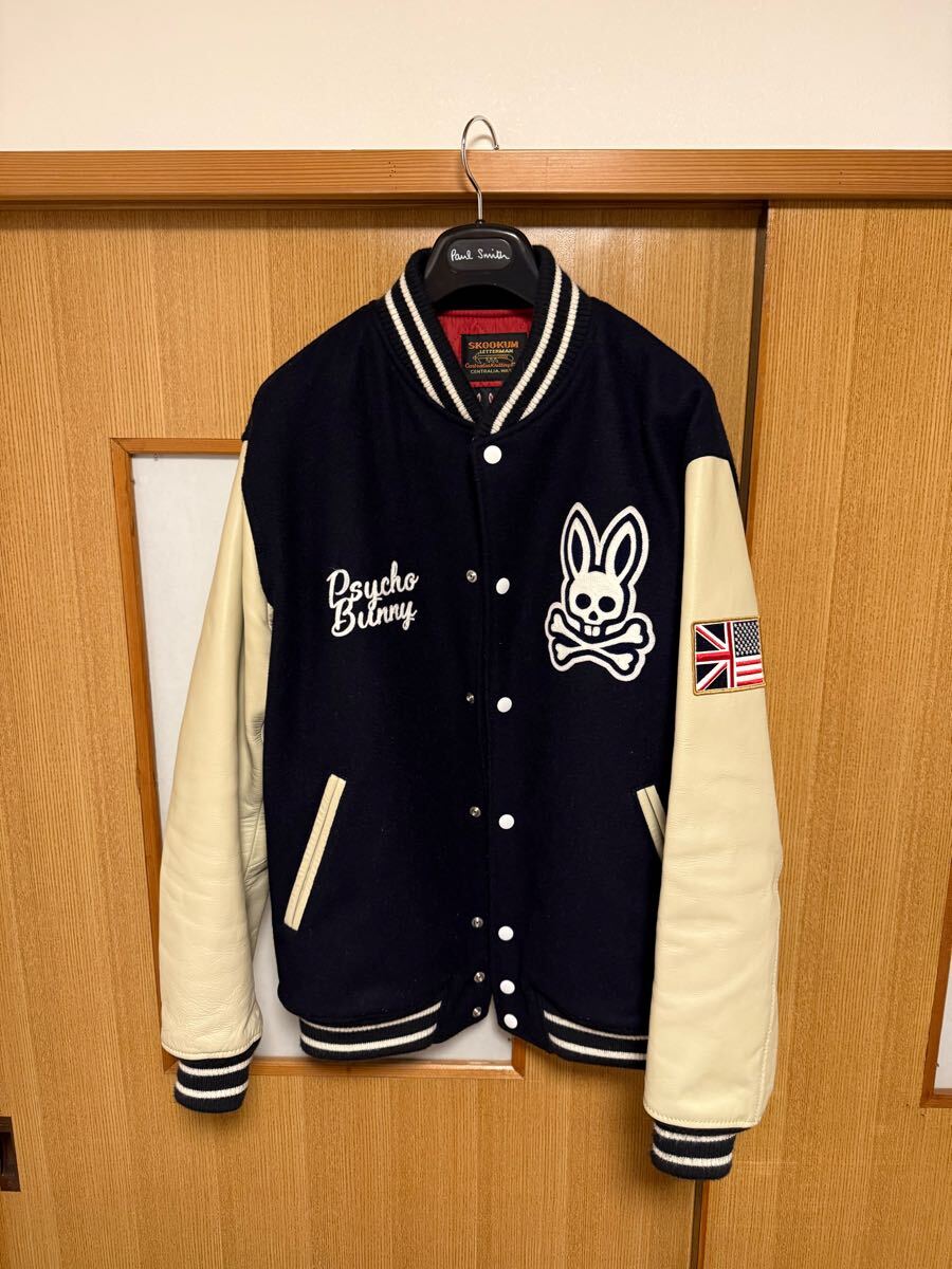 サイコバニー SKOOKUM × Psycho Bunny アワードジャケット スタジャン XL拍卖