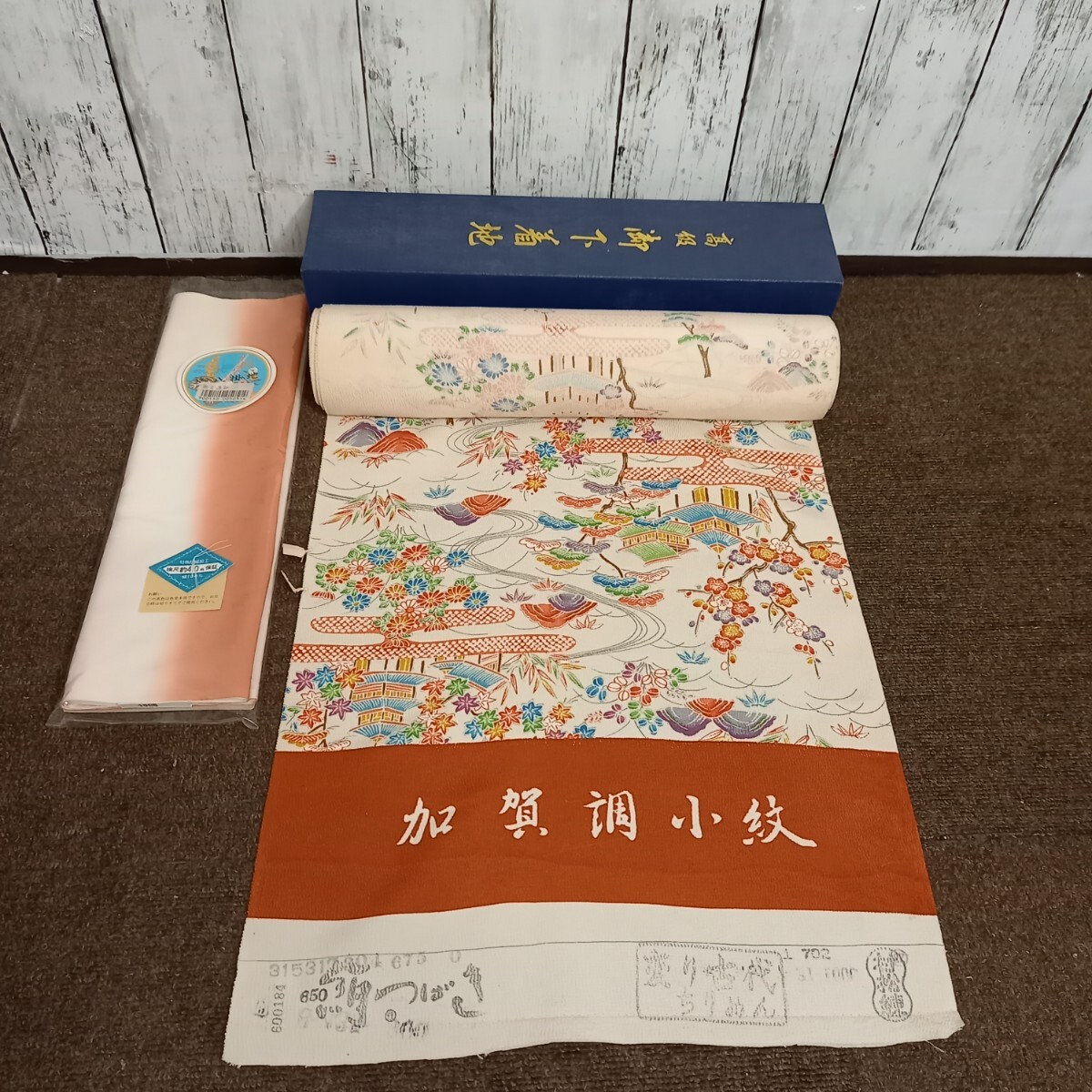 未使用保管品 婦人 着物反物 着尺 未仕立て 正絹/ちりめん 加賀調小紋 絹つばき拍卖