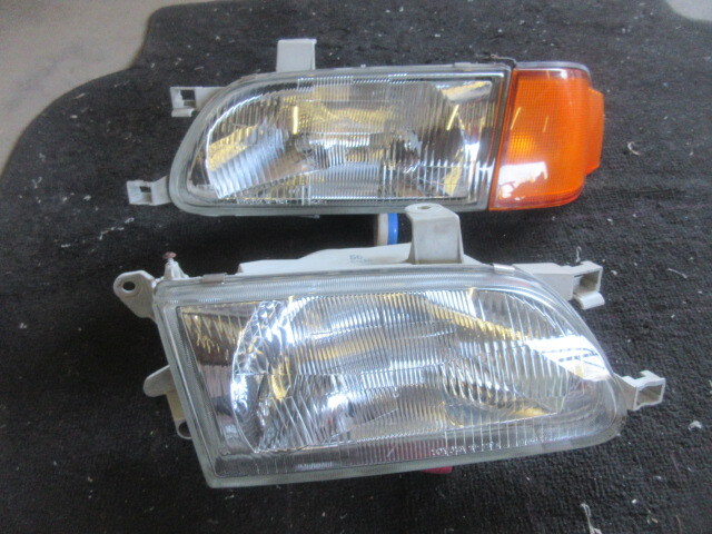 ★⑥R7G8979 EL51 コルサ 純正ヘッドライトセット おまけ付 修理やストック等に拍卖