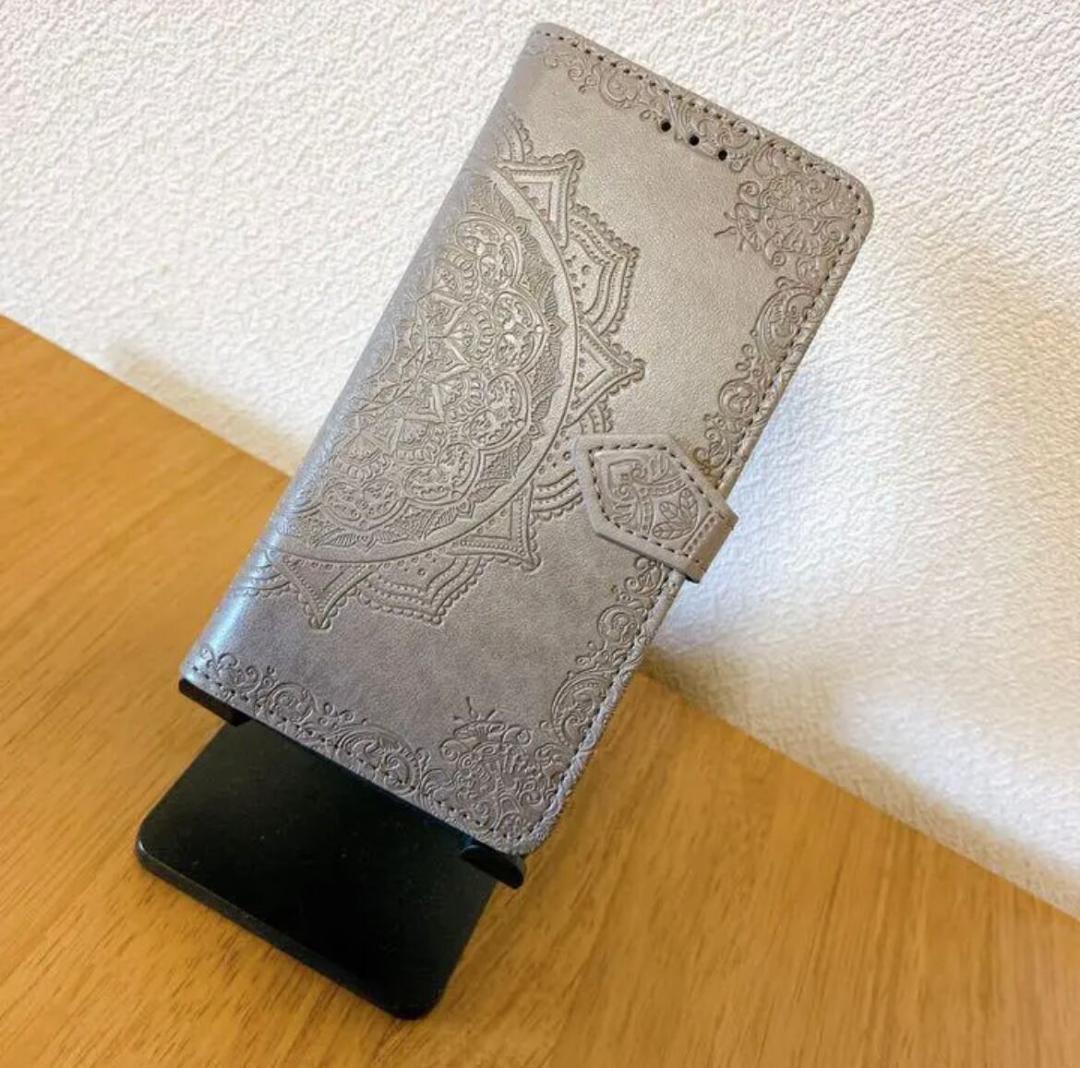 エンボス加工スマホケース 手帳型 iPhone13/14 グレー拍卖