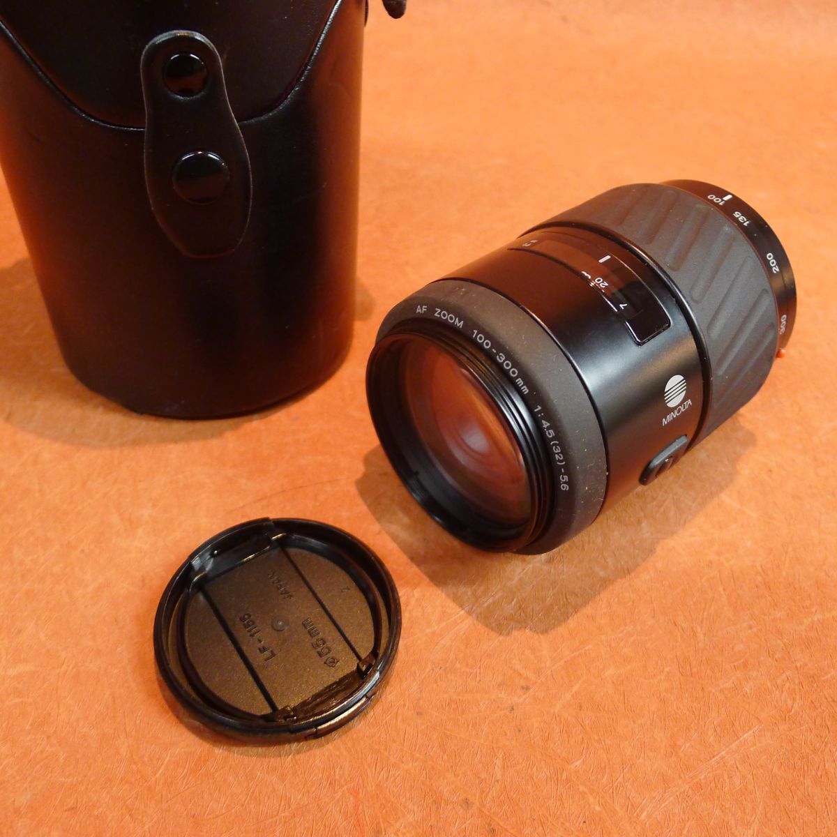 b◆207 一眼レフ用レンズ MINOLTA AF ZOOM 100-300mm F1:4.5-5.6 ケース付 動作未確認 /60拍卖