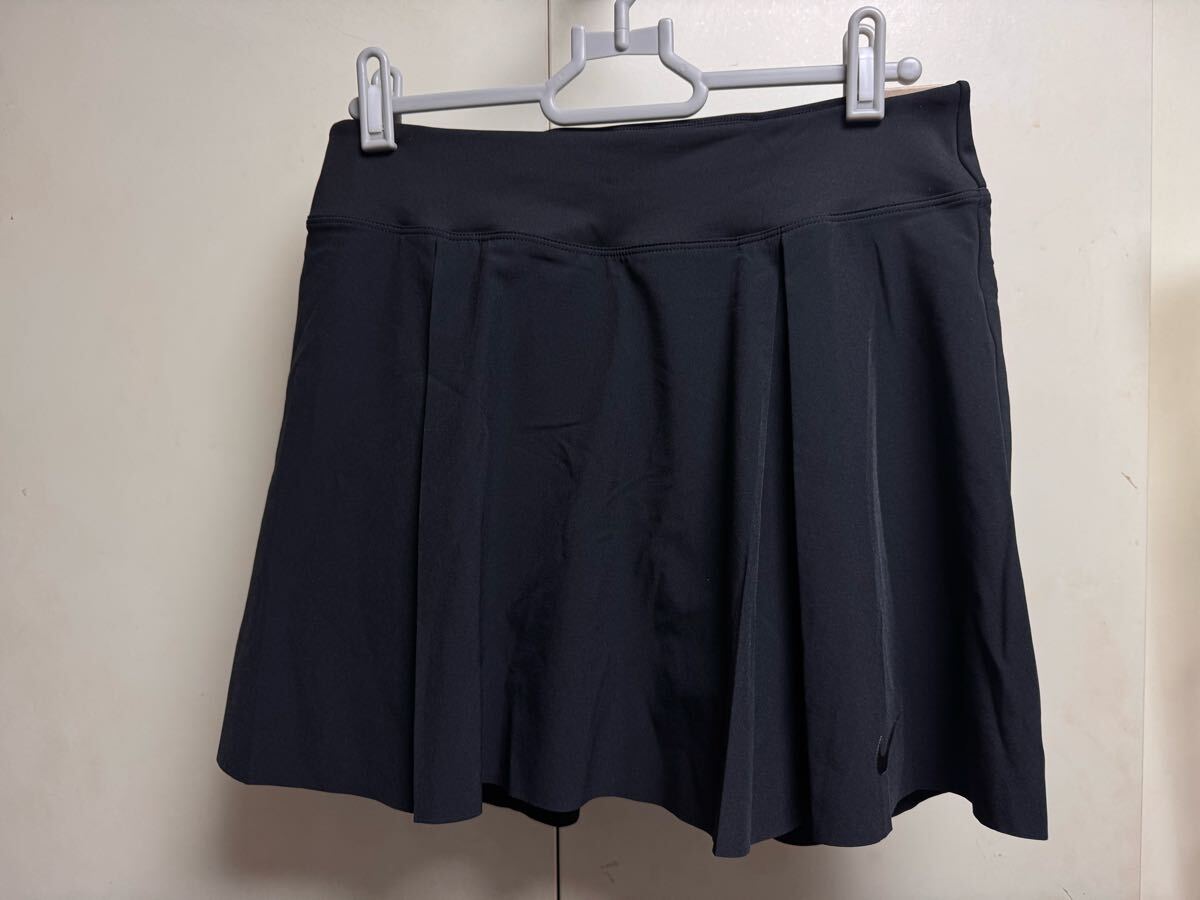 送料格安スピード発送!新品未使用★NIKEナイキランニングスカート黒インナータイツ付き★レディースMサイズ登山トレランマラソン拍卖