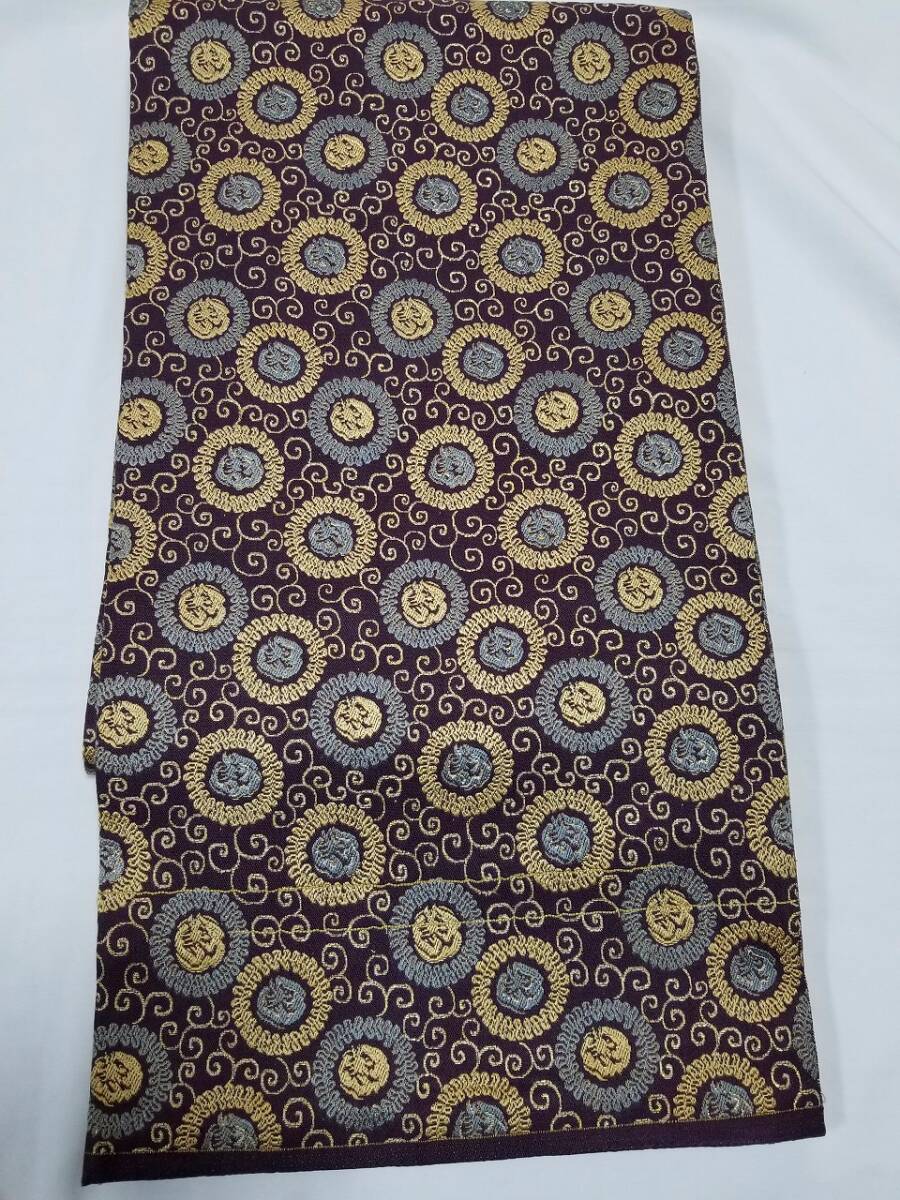 【桐輪】本袋帯☆送料無料*期間限定20%OFF{正絹*西陣織*正倉院文様*本袋帯}*表.裏-全通柄*金箔糸織の唐草と花丸文*ケシ紫色地**№4301拍卖