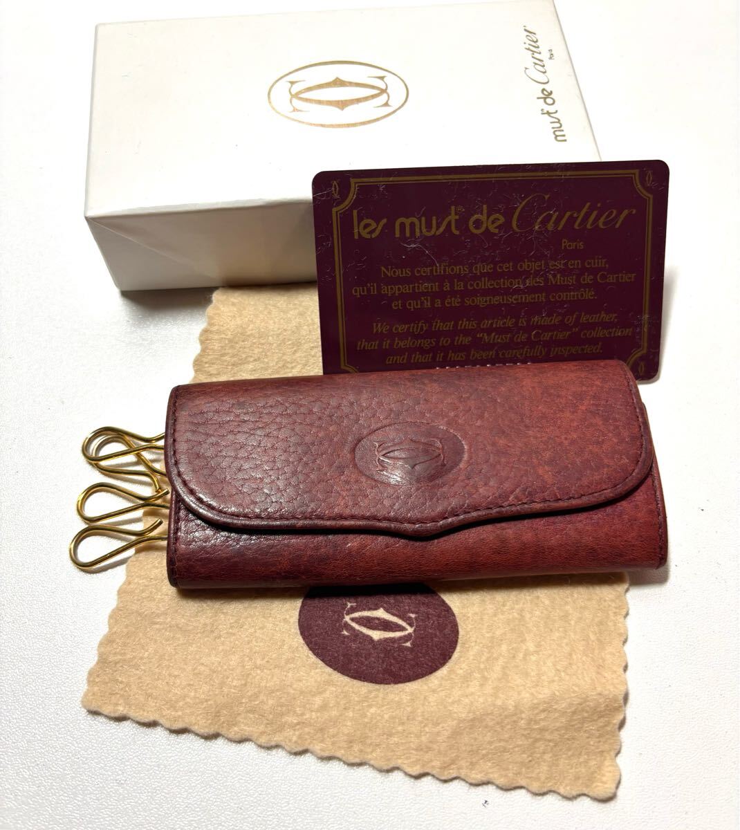 ◆ Cartier マストライン キーケース 4連 ボルドー 箱 ギャランティーカード完備 拍卖