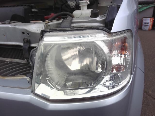 (中古品)オッティ DBA-H92W 左ヘッドランプASSY S 3G83 A31 26060-6A02B 148025拍卖