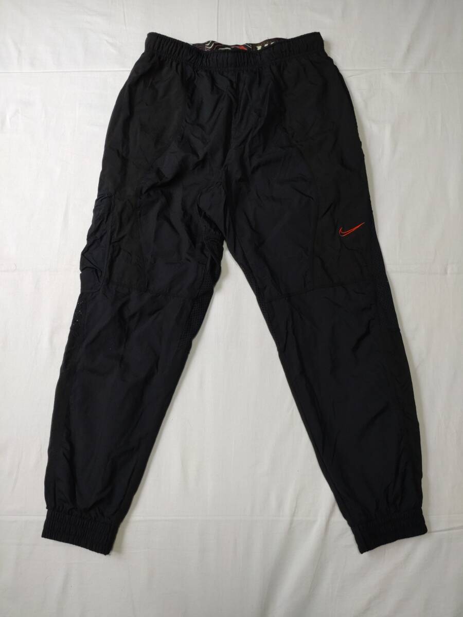 NIKE ナイキ Dri-FIT 軽量速乾ナイロン 高通気性メッシュ ウィンド ナイロン ロングパンツ size M ブラック 美品 DM1050 ロゴ刺繍拍卖