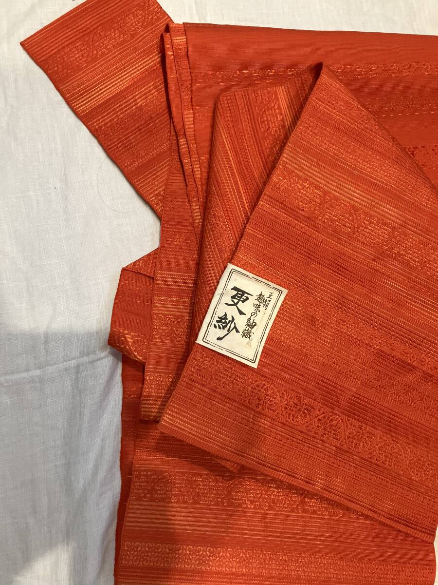 ♪紬 更紗の帯 未使用 美しいオレンジ色拍卖