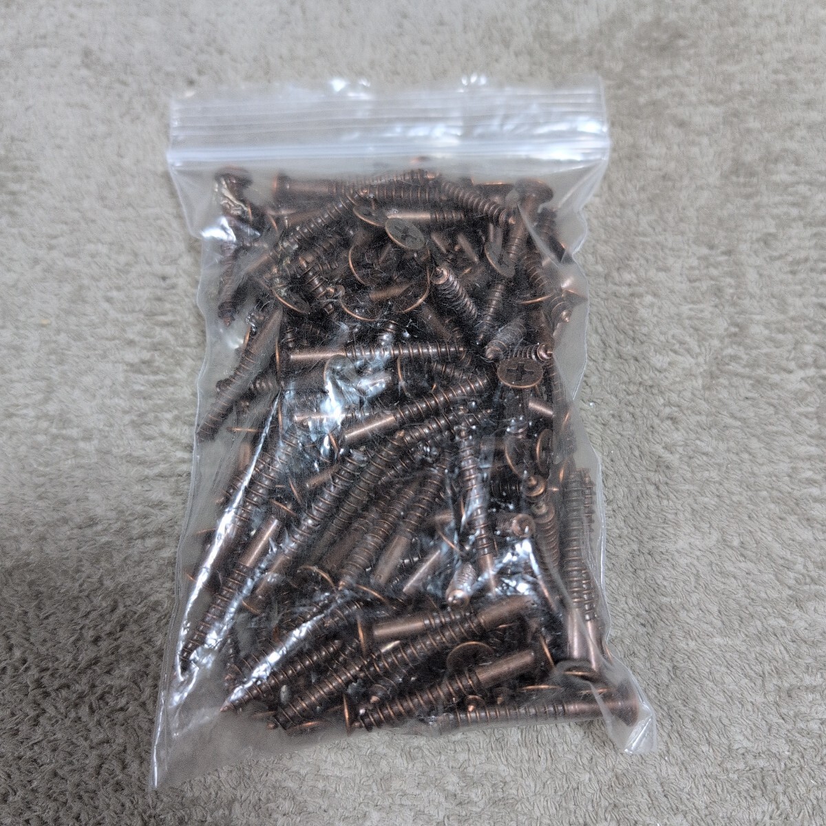 ジャンク品/長期保管品/中古品/メーカー不明/ユニクロ/木ネジ/皿4.5×38mm/茶色/ブロンズメッキ付き/1P約130本入り拍卖