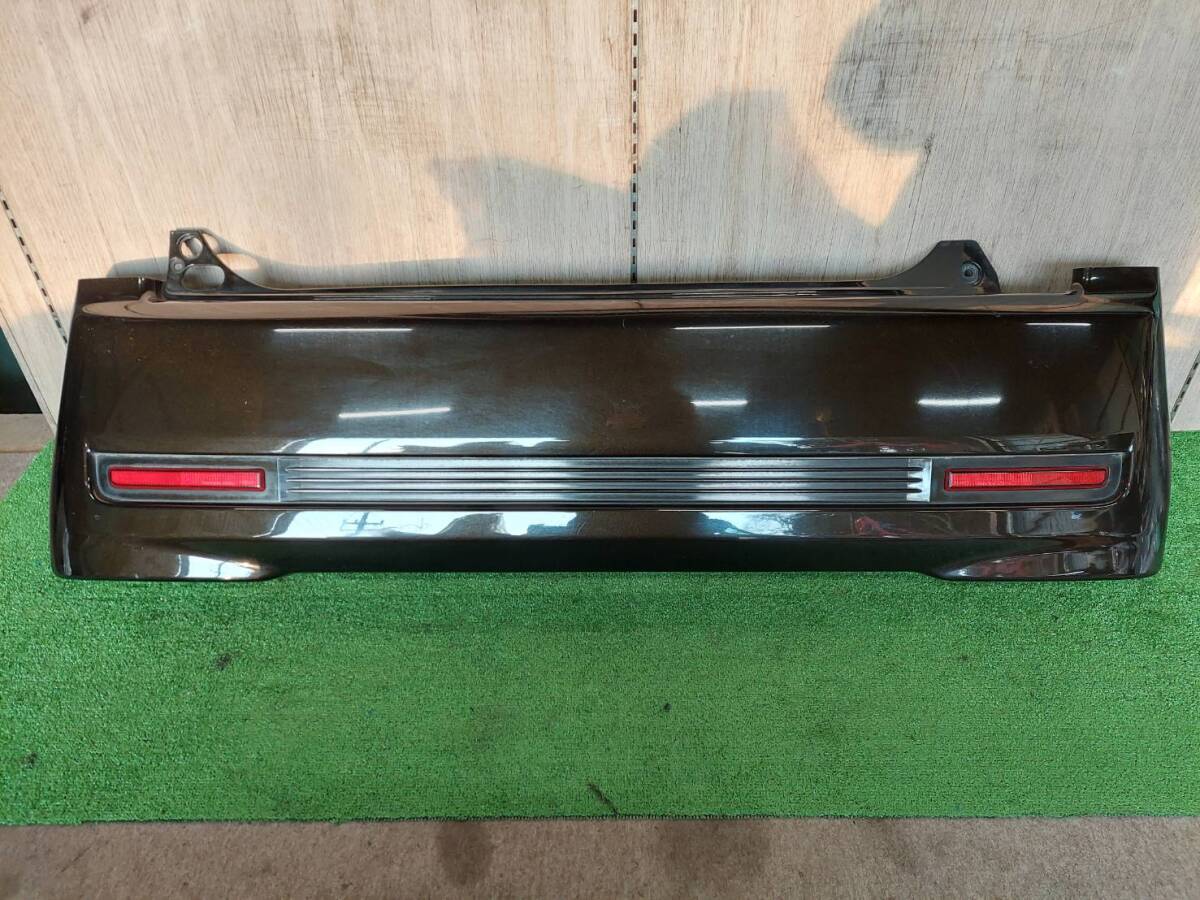 ダイハツムーヴカスタム① DBA-L175S リアバンパー カラーNO:X10拍卖