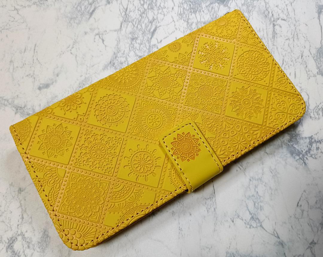 送料込み グーグル Pixel7 用 手帳型 ケース 浮き彫り調 アラベスク 黄色拍卖
