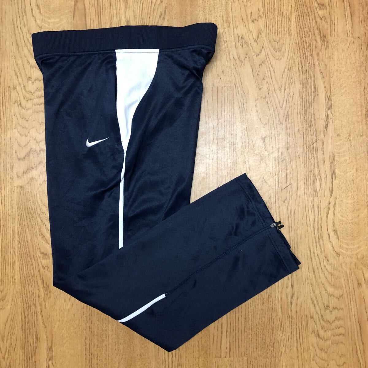 NIKE DRY-FIT ナイキ メンズM ロングパンツ ジャージパンツ ボトムス ネイビー ロゴ刺繍 裾ファスナーあり トレーニング スポーツウェア拍卖