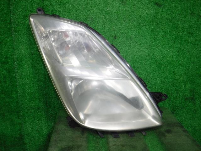 プリウス DAA-NHW20 右ヘッドランプASSY 1NZ-FXE 81130-47060拍卖