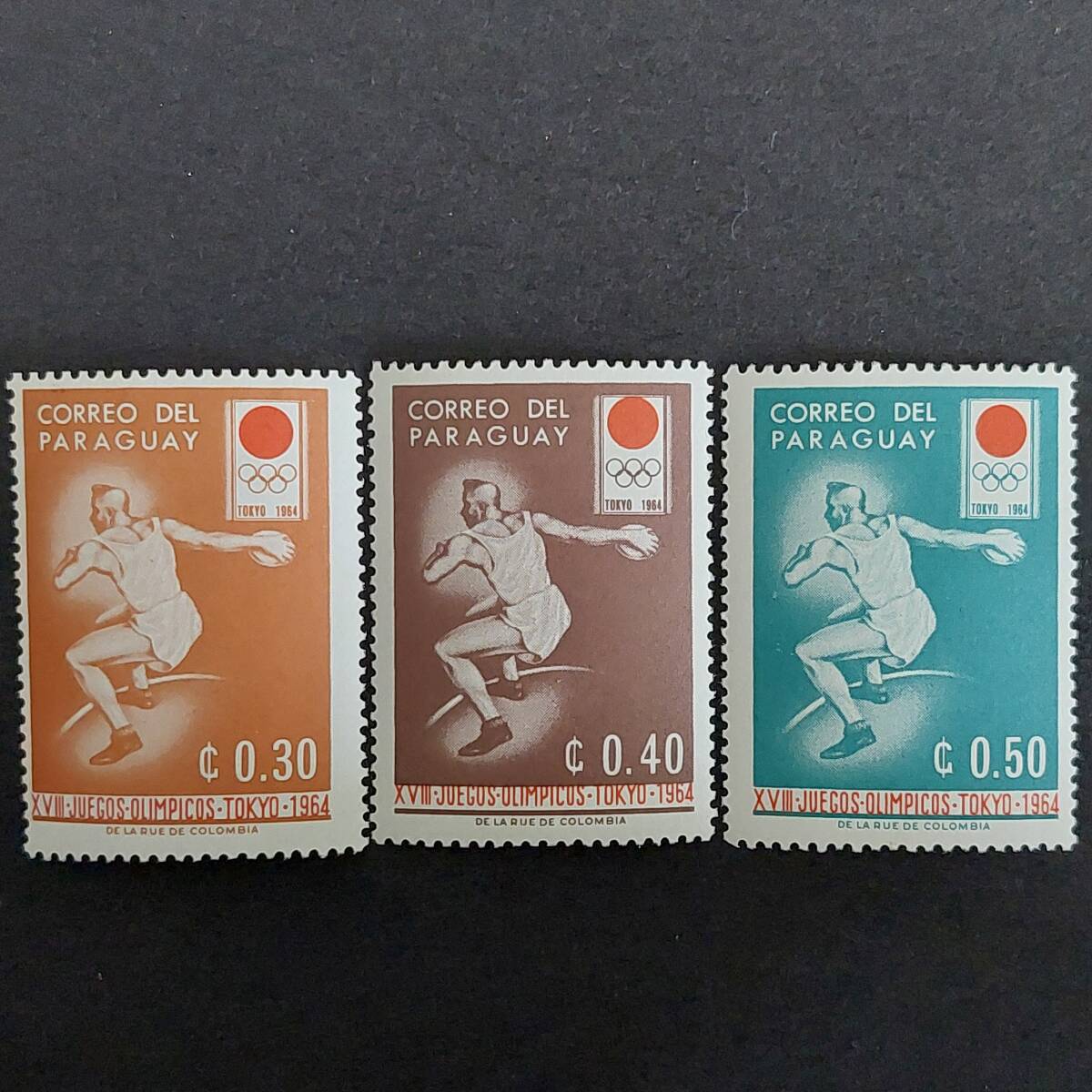 K753 パラグアイ切手「1964年『第18回東京夏季オリンピック競技大会』記念切手 3種セット デザイン:『円盤投げ』」1964年発行 未使用拍卖