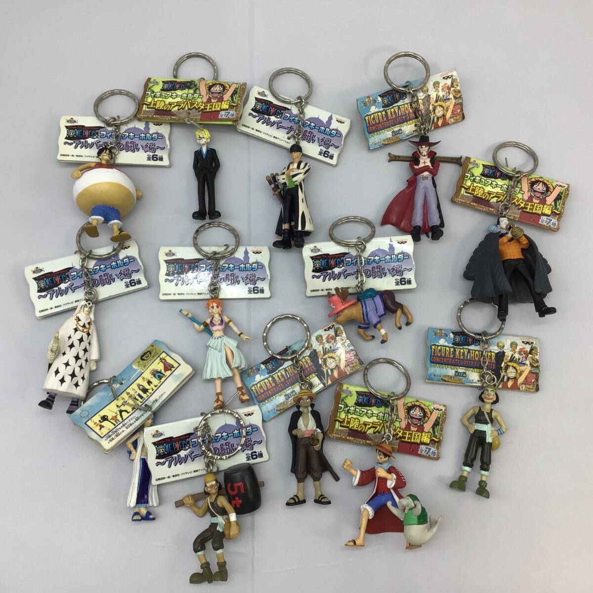 6096 【タグ付き】初期 ワンピース フィギュアキーホルダー 13個 まとめ上陸のアラバスタ王国編 アルバーナの闘い編 ルフィ海賊団集結編拍卖