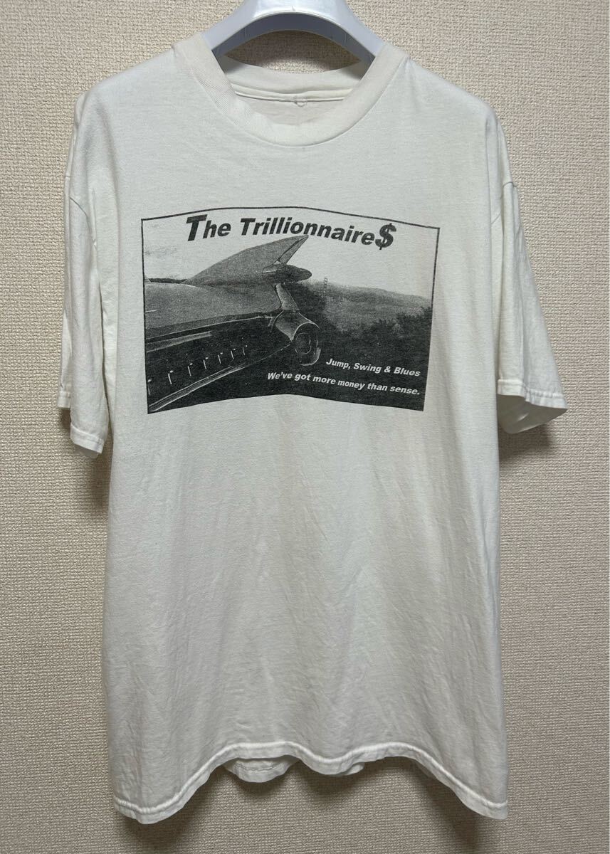 プリントTシャツ 半袖Tシャツ The Trillionnaire $ ダメージ Tシャツ Jump.Swing&Blues ロゴ ホワイト系 USA古着 L相当 拍卖