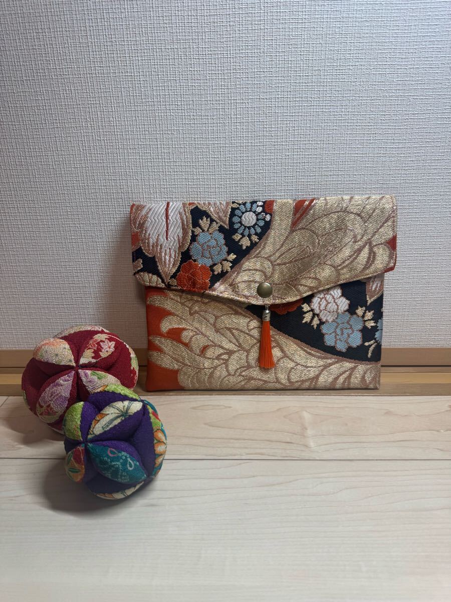 ★御朱印帳ポーチ 御朱印帳2冊入ります ハンドメイド 通帳 足袋 1点物 着物 オレンジ 帯リメイク タッセル付 クラッチバック★ 拍卖