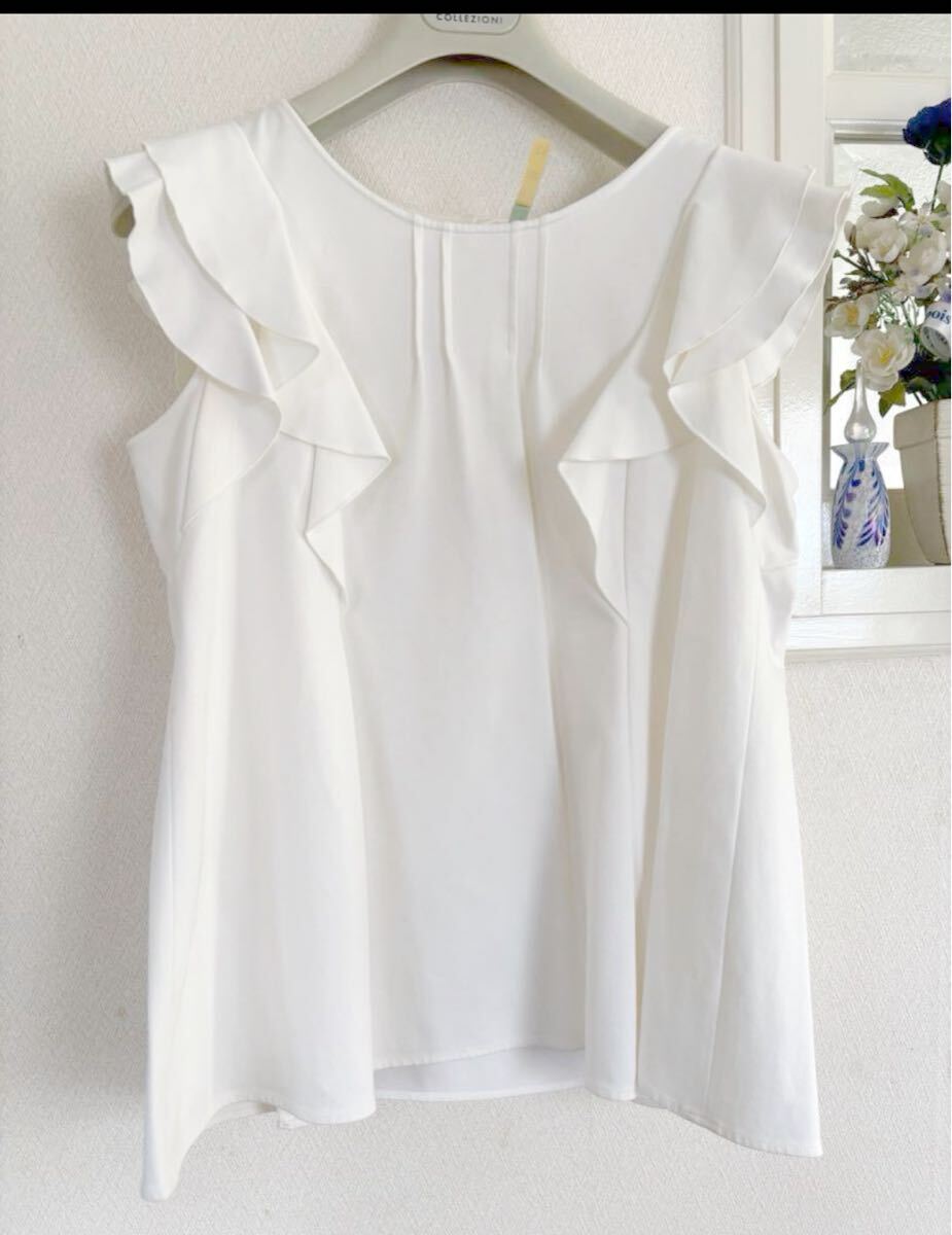 エムプルミエブラック ノースリーブフリルブラウス オフホワイト36拍卖