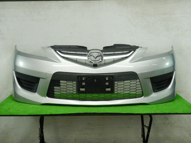 15F】【22V】【送料記載】 プレマシー CREW フロントバンパー C2Y1-50-03XA67 C291-50031 サンライトシルバーメタリック【501310】拍卖