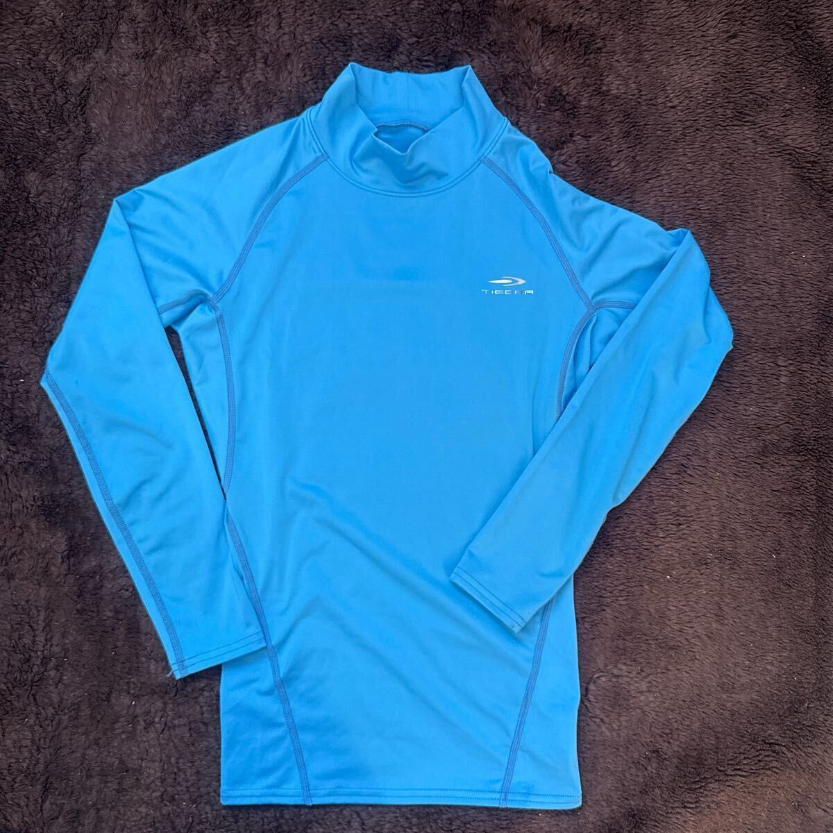 ティゴラ コンプレッションインナー 長袖S 水色拍卖