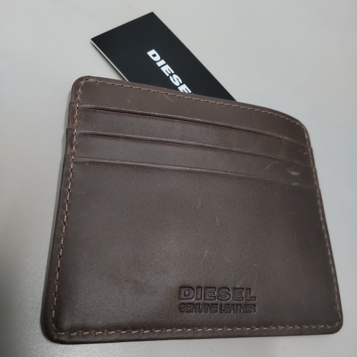 新品未使用タグ付DIESEL ディーゼルカードケースブラウン拍卖