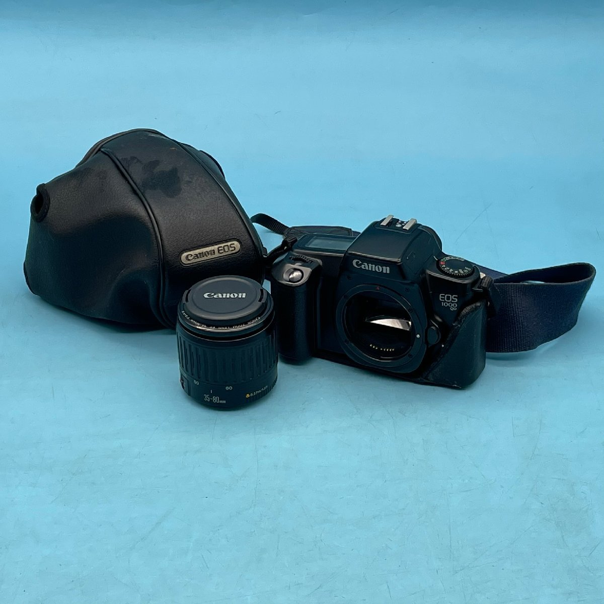 F2【16614Q009】フィルムカメラ Canon EOS1000QD/ZOOM LENS EF 35-80㎜ 1:4-5.6 レトロカメラ キヤノン ※ケース難有 動作未確認拍卖
