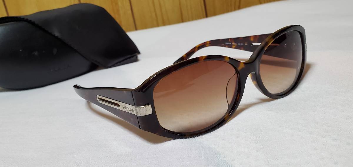 正規 激レア PRADAプラダ ロゴ装飾サングラス茶 オープンメタルアロー×デミブラウン 男女兼用 眼鏡〇付属有 エンブレムメタリックシルバー拍卖