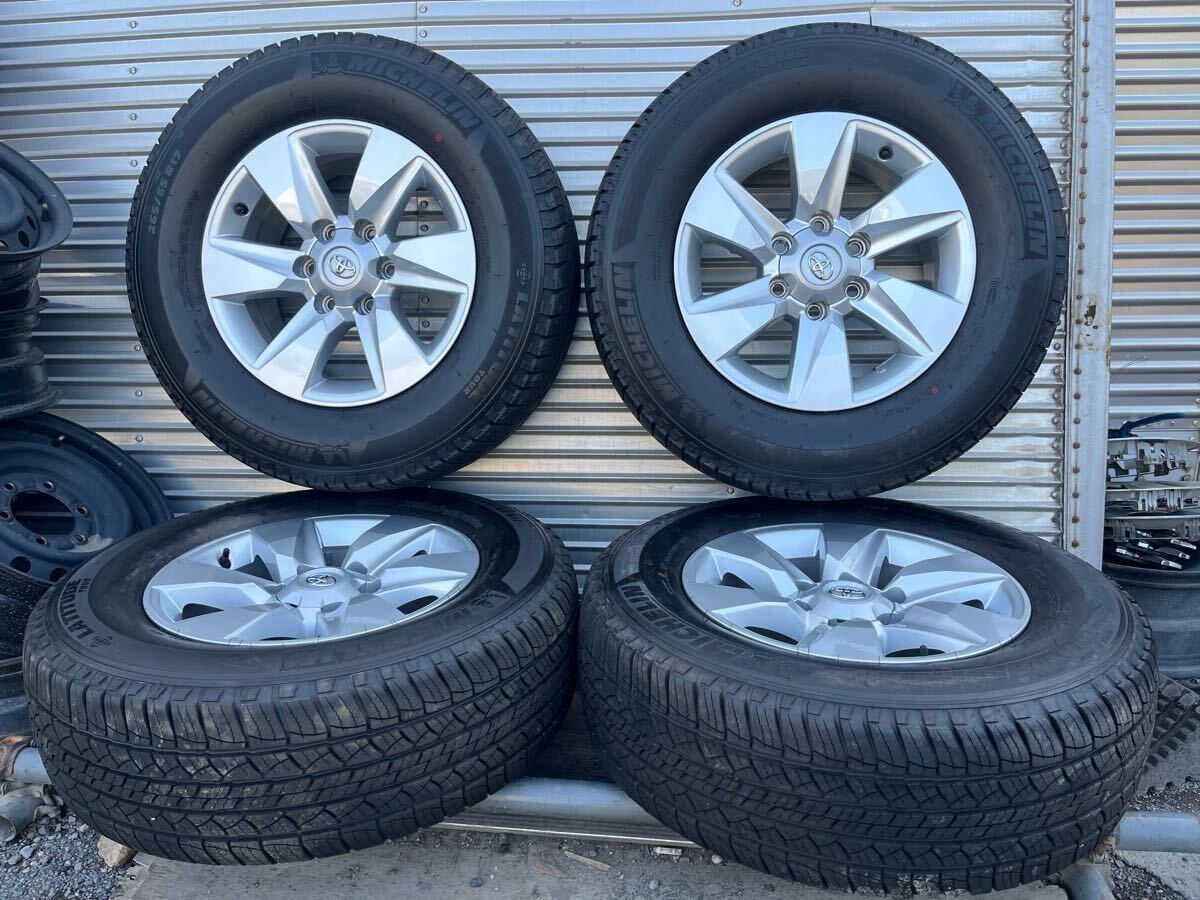 17X7.5J PCD 139.7 6H ET 25 ランクル150系 プラド 純正 アルミホイール 265/65R17 2018年製 MICHELIN LATITUDE TOUR 夏タイヤ 4本 セット拍卖