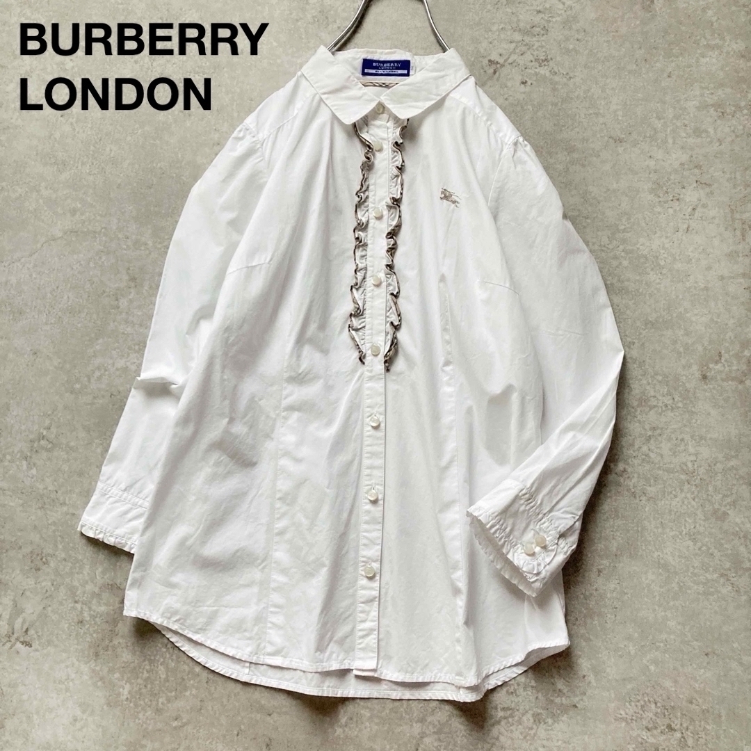 * バーバリーブルーレーベル フリルシャツ 長袖 ギャザー ノバチェック ロゴ刺繍 ホース ホワイト コットン BURBERRY BLUELABEL 三陽商会拍卖