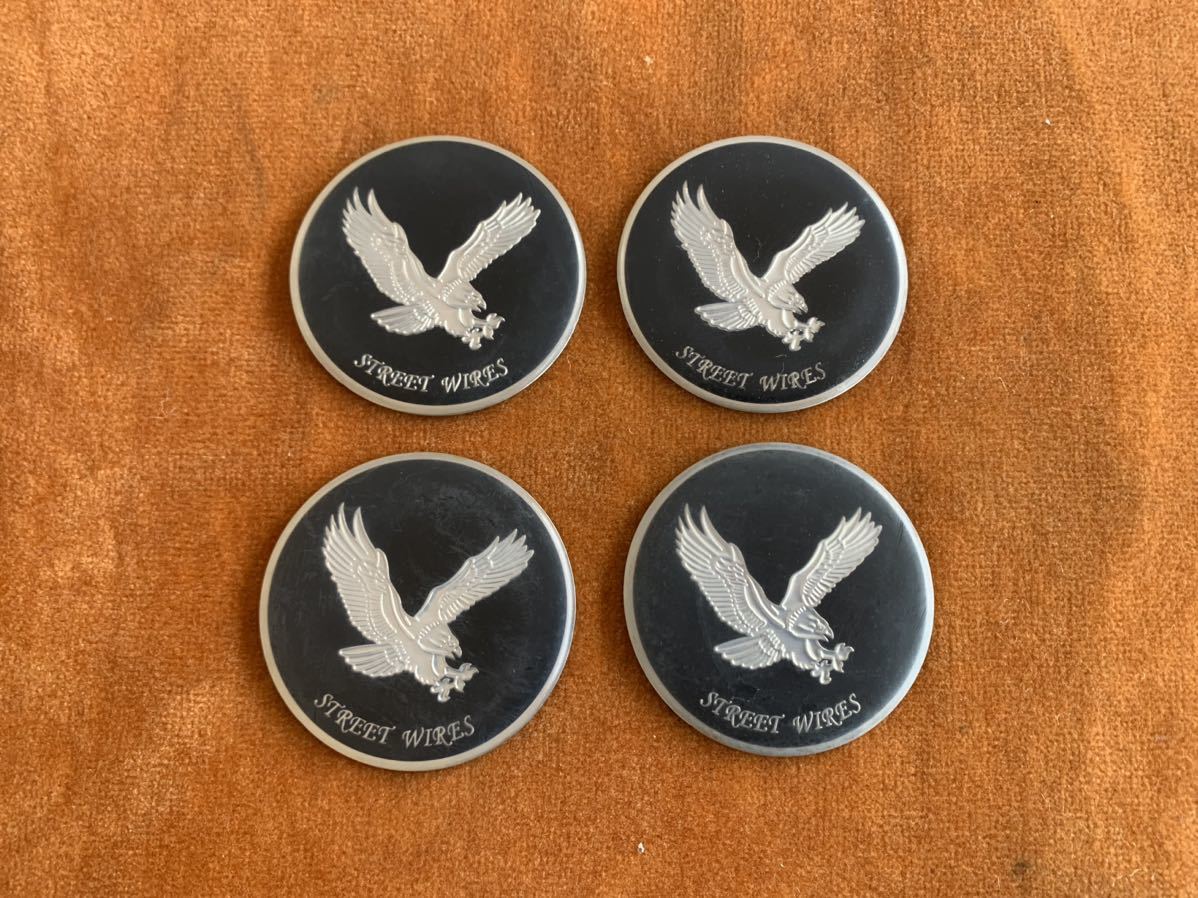 ストリートワイヤーエンブレム4枚セット。ブラック ワイヤーホイールエンブレム ノックオフエンブレム デイトンインパラベルエア拍卖