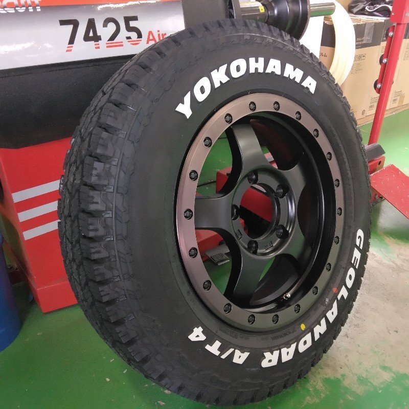 新品 ジムニー タイヤホイールセット 4本 ホワイトレター 16インチ JB64 JB23 JA11 YOKOHAMA GEOLANDAR AT4 G015 185/85R16拍卖