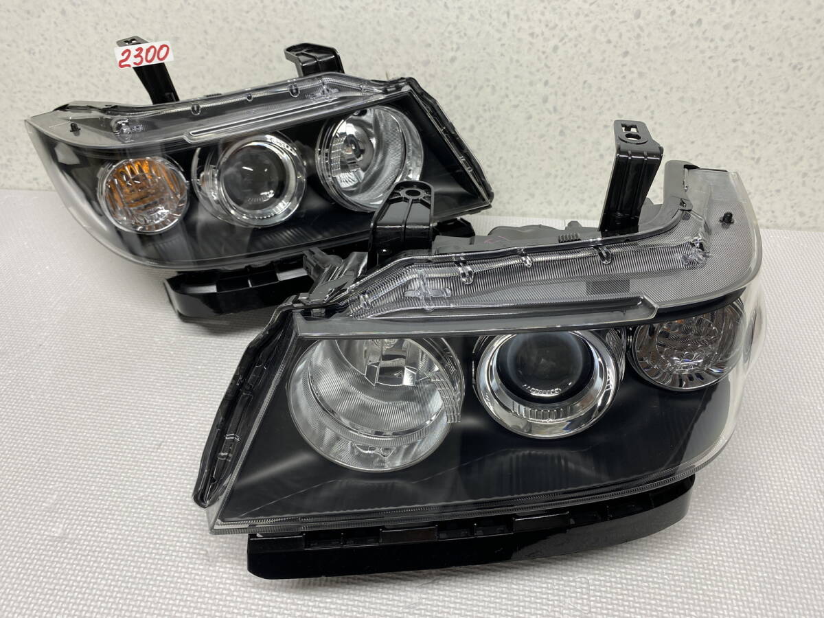 2300 * ゼストスパーク JE1 JE2 HID ヘッドライト 左右 SET 左 右 100-22911 打刻印拍卖