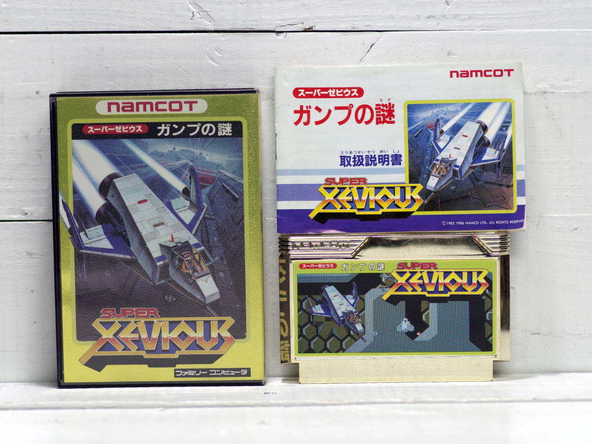 M12479【FC】スーパーゼビウス ガンプの謎 箱/説明書付 起動OK!! コレクターアイテム エタノールで端子清掃済 動画ありゆうメール250gなど拍卖