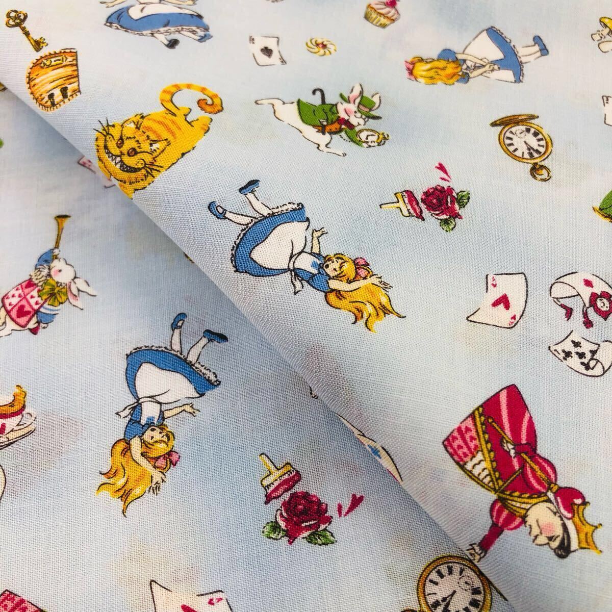 1m 日本製 シーチング 不思議の国のアリス 生地 アリス柄 トランプ はぎれ コットン 水色拍卖