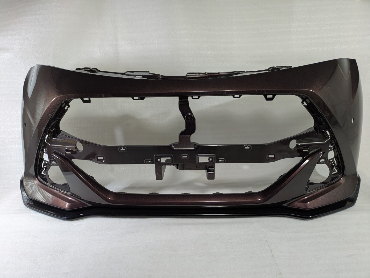 トヨタ純正 M900A/M910A タンクカスタム フロントバンパー52119-B1370 スポイラー付き ブラウン 棚番G-1050拍卖